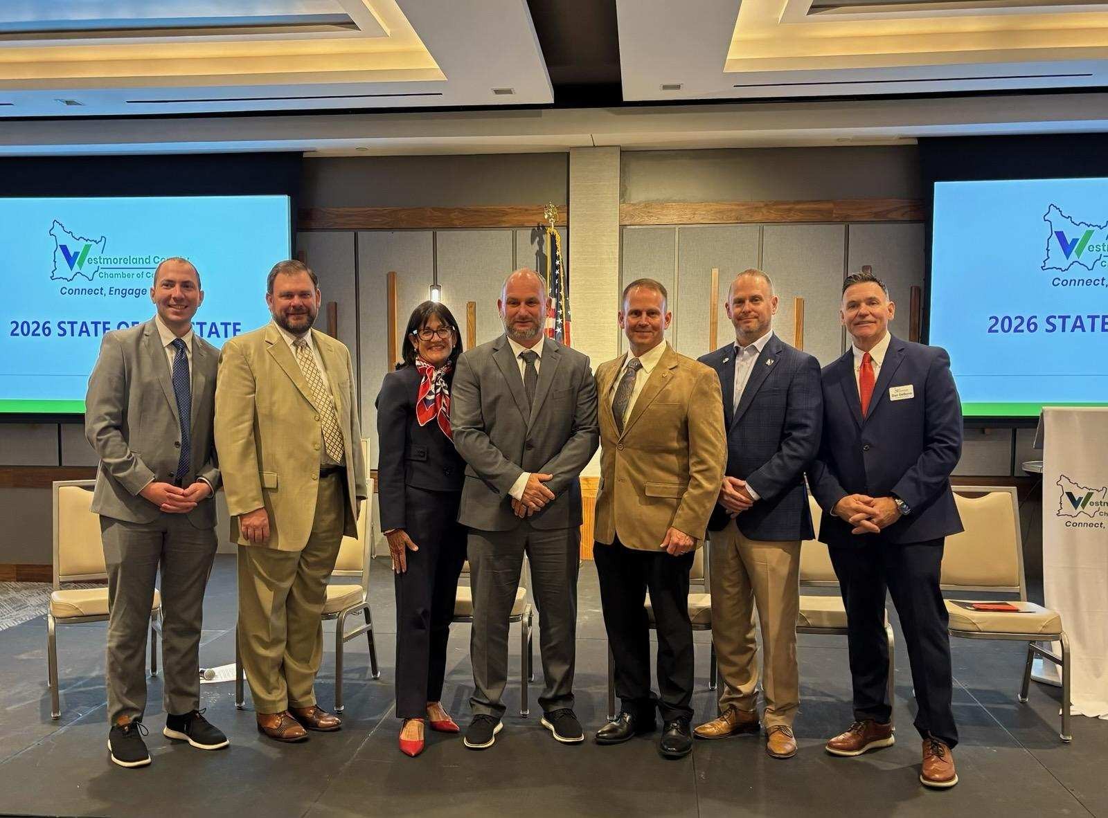 Sen. Pittman pictured with 6 people from the Annual State of the State event.